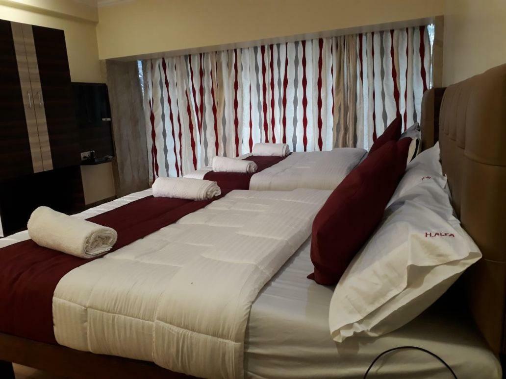 Hotel Alfa International Near Nanavati Hospital Mumbai Near Airport Mumbai Near Juhu Beach Kültér fotó